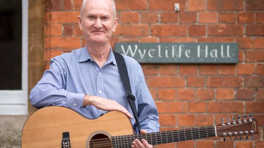 David Clifton in front of Wycliffe Hall sign